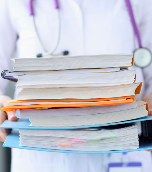 doctor-is-holding-large-stack-of-folders-disease-history-concept-2