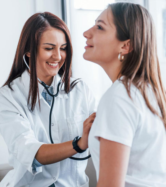 using-stethoscope-young-woman-have-visit-with-female-doctor-modern-clinic-Model-Research-Center.Paid-Clinical-Trials-Research-Facility-in-Tampa